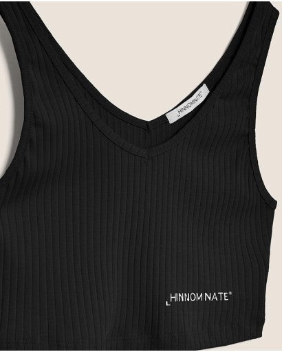 HINNOMINATE top in costina con scollo (disponibile nero e bianco)