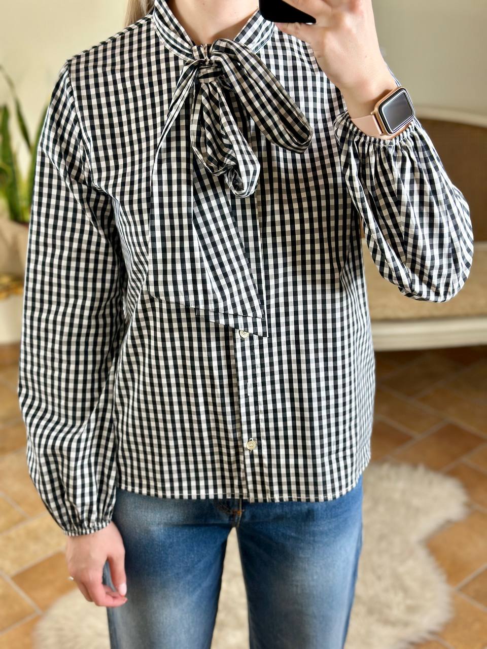 Tensione In camicia a quadretti con fiocco